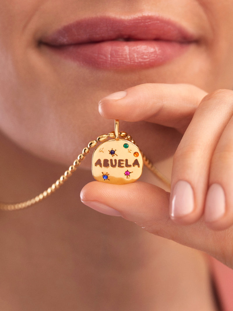 Abuela Charm, vegoldet