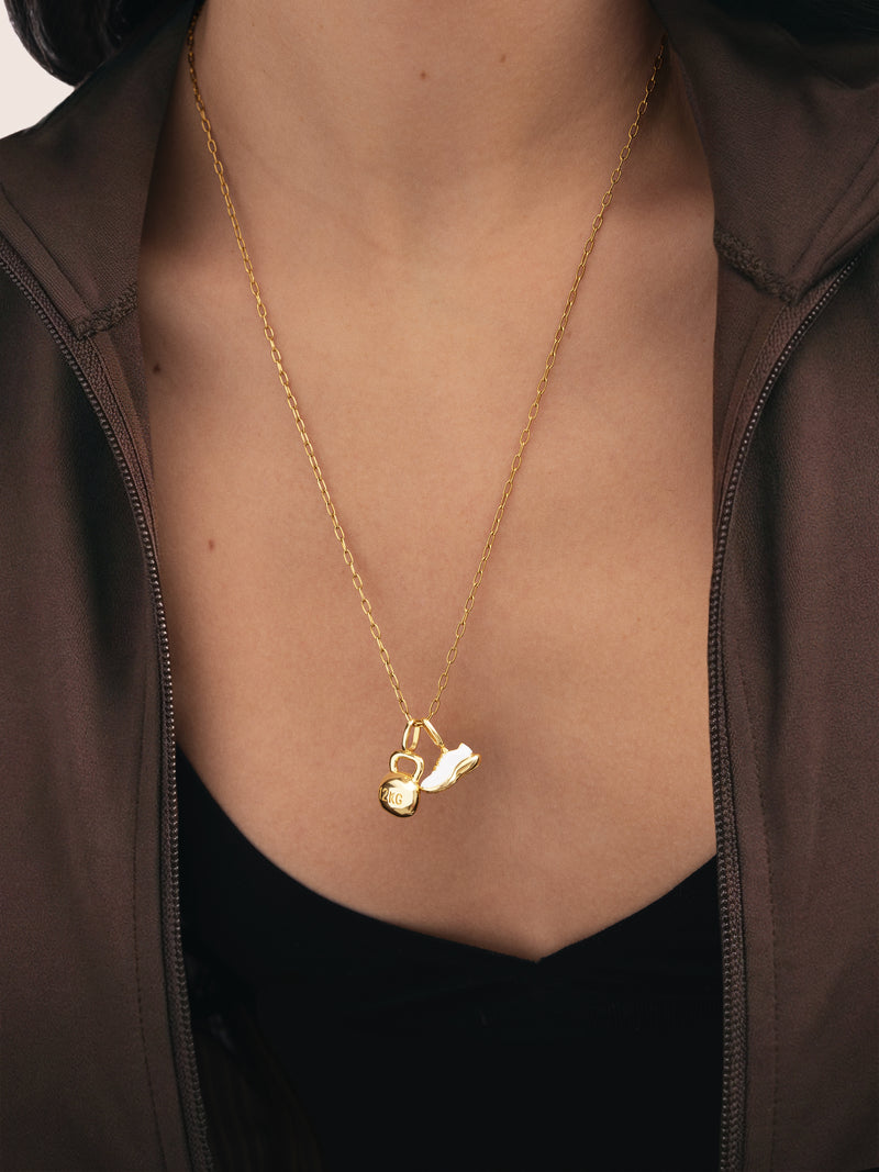 Charm Kettlebell Baño Oro