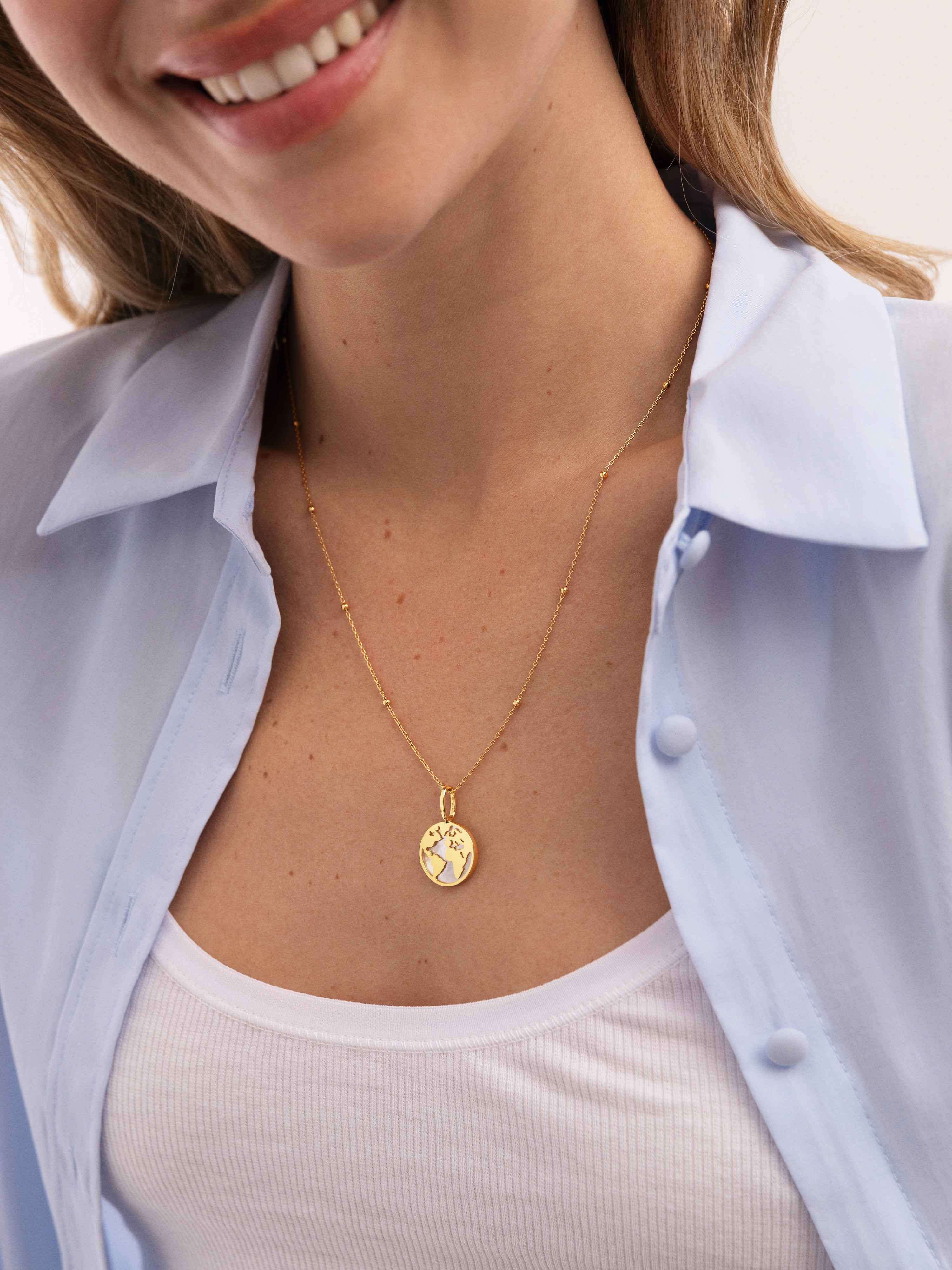 Wold Mother of Pearl Gold Charm