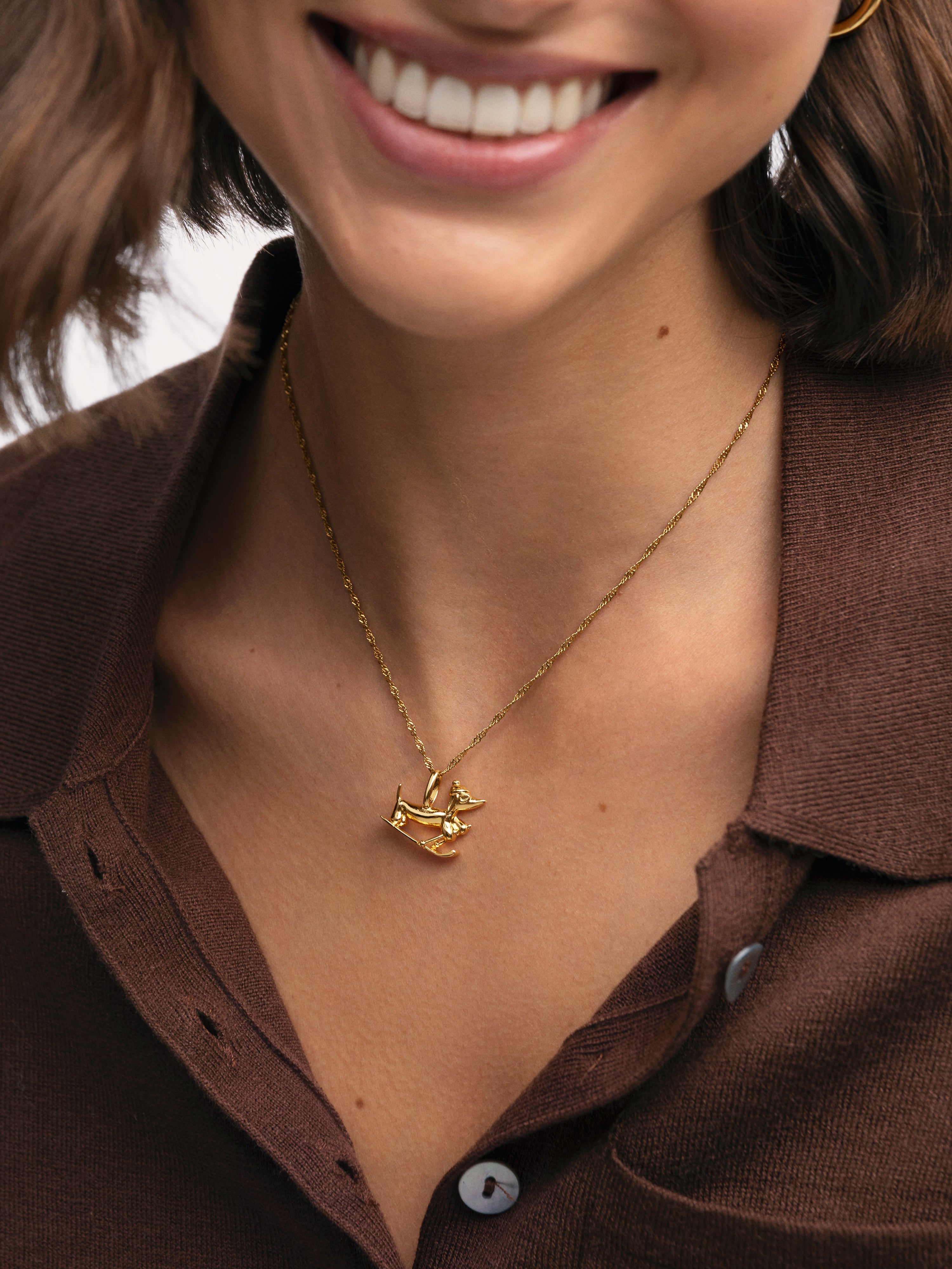 Charm Winter Teckel Baño Oro