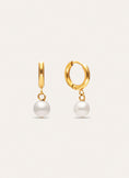 Boucles d'oreilles créoles perle acier plaqué or