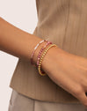 Pulsera Amulet Rodocrosita Acero Baño Oro