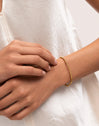 Bracelet chapelet acier plaqué or - puesto en modelo