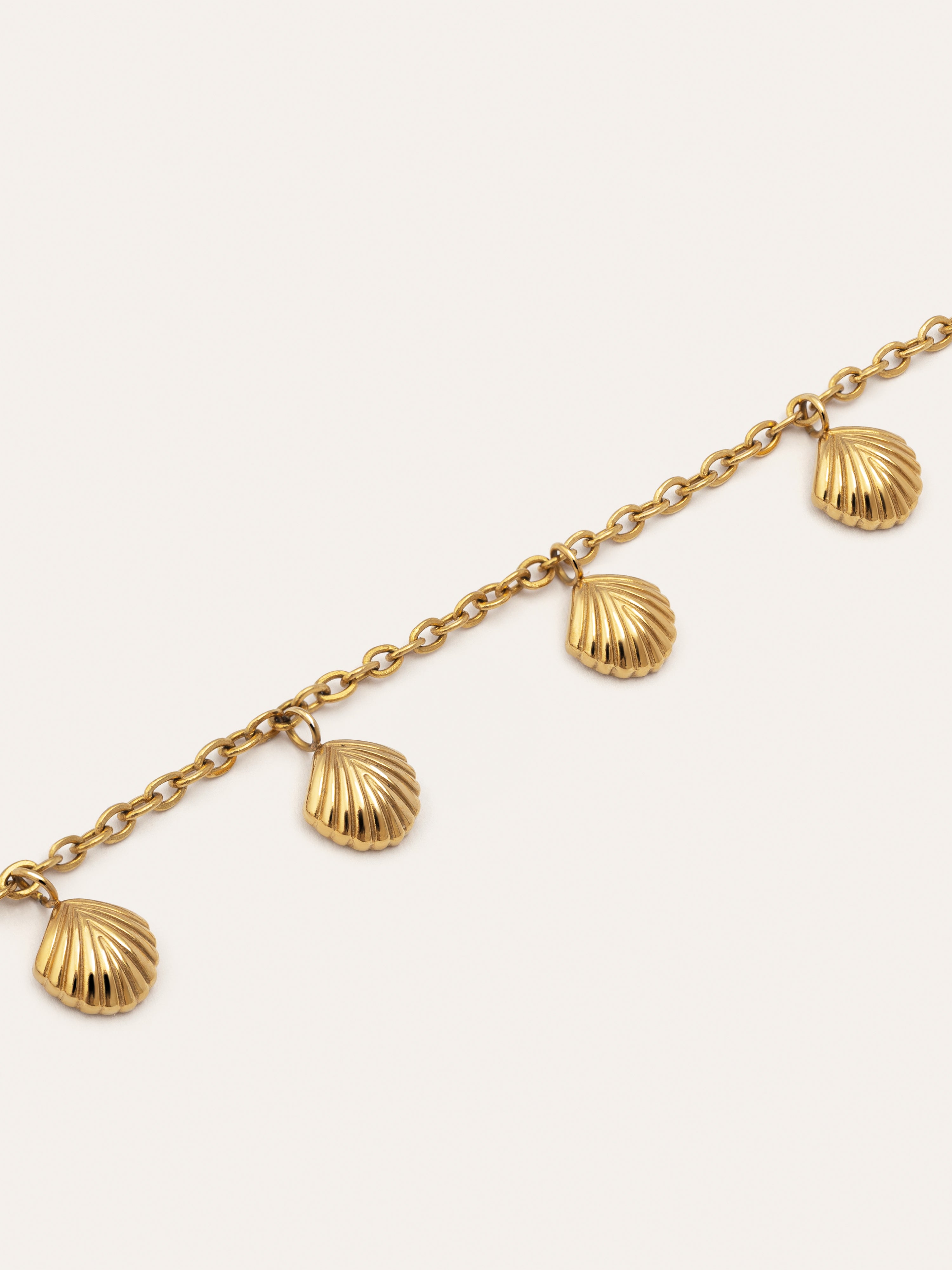 Tobillera Dancing Shells Acero Baño Oro